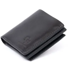 Вертикальне глянсове портмоне з накладною монетницьою GRANDE PELLE 11329 Чорне
