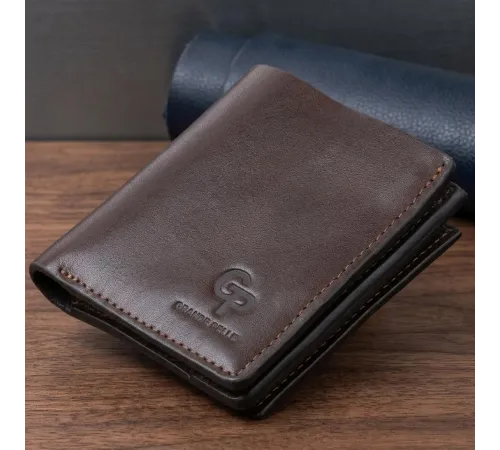 Вертикальне глянсове портмоне з накладною монетницьою GRANDE PELLE 11330 Шоколадне