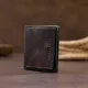 Вертикальне глянсове портмоне з накладною монетницьою GRANDE PELLE 11330 Шоколадне
