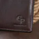 Вертикальне глянсове портмоне з накладною монетницьою GRANDE PELLE 11330 Шоколадне
