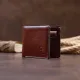 Горизонтальне портмоне в гладкій шкірі на магнітах GRANDE PELLE 11308 Коричневе