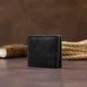 Портмоне вертикальне з круглим магнітом на два відділення GRANDE PELLE 11306 Чорне