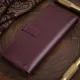 Шкіряне глянсове портмоне GRANDE PELLE 11467 Бордовий