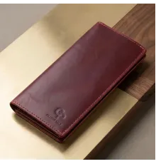 Шкіряне вінтажне портмоне GRANDE PELLE 11468 Бордовий