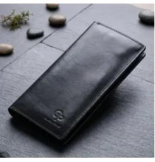 Вертикальне шкіряне портмоне унісекс GRANDE PELLE 11556 Синій