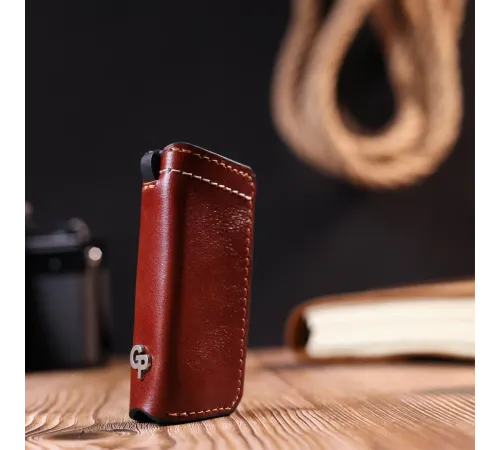 Зручна шкіряна ключниця Grande Pelle 11392 Коричневий