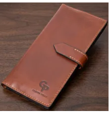 Цікавий вертикальний гаманець із натуральної шкіри GRANDE PELLE 11660 Коричневий