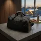 Текстильна дорожня сумка для поїздок спорту та туризму FABRA 22581 Чорна